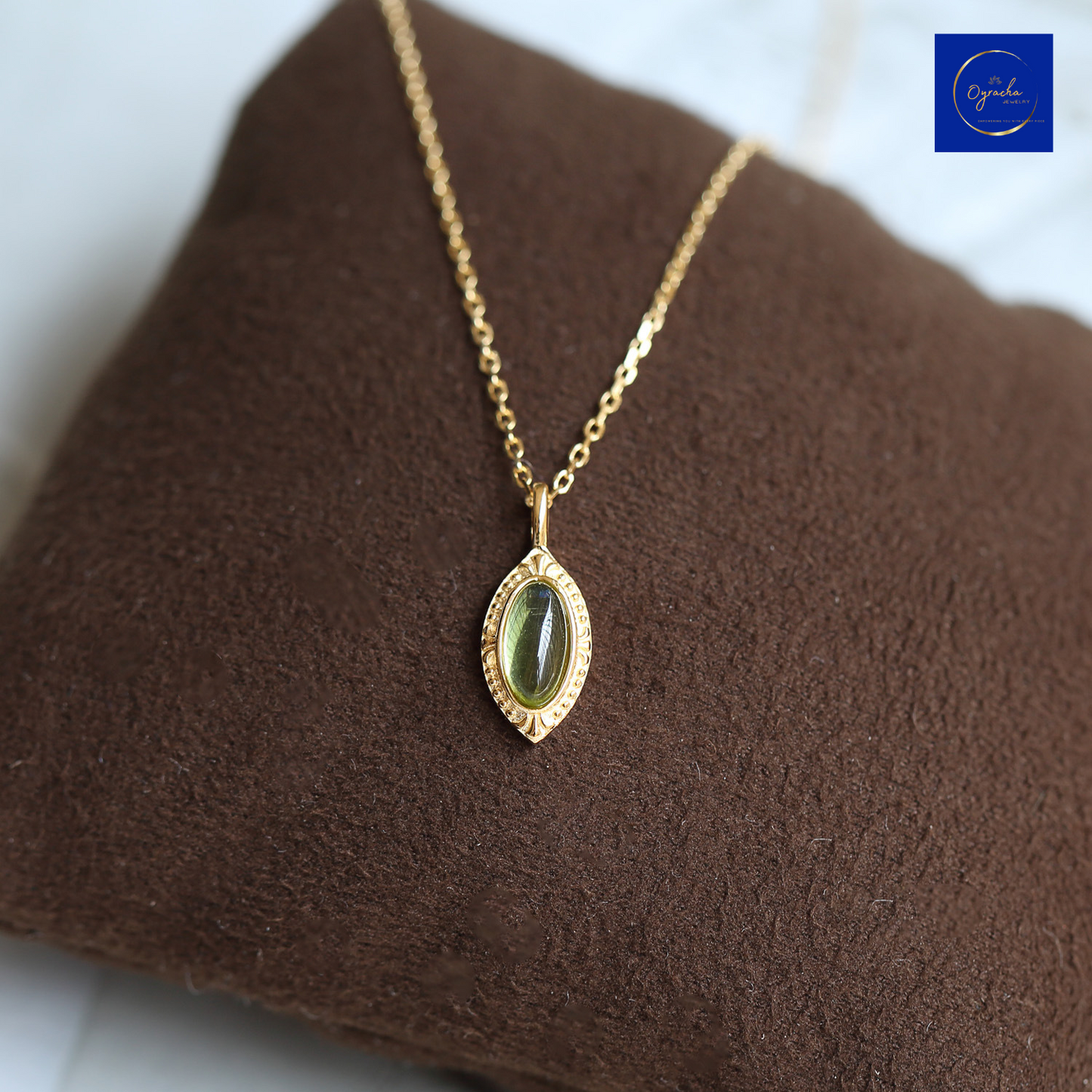 "Stunning peridot gemstone necklace with gold-tone detailing from Oyracha Jewelry. A beautiful piece featuring natural peridot, known for its healing properties, perfect for those born under the Chinese zodiac sign of Monkey. Discover Oyracha's zodiac-inspired jewelry collection."

